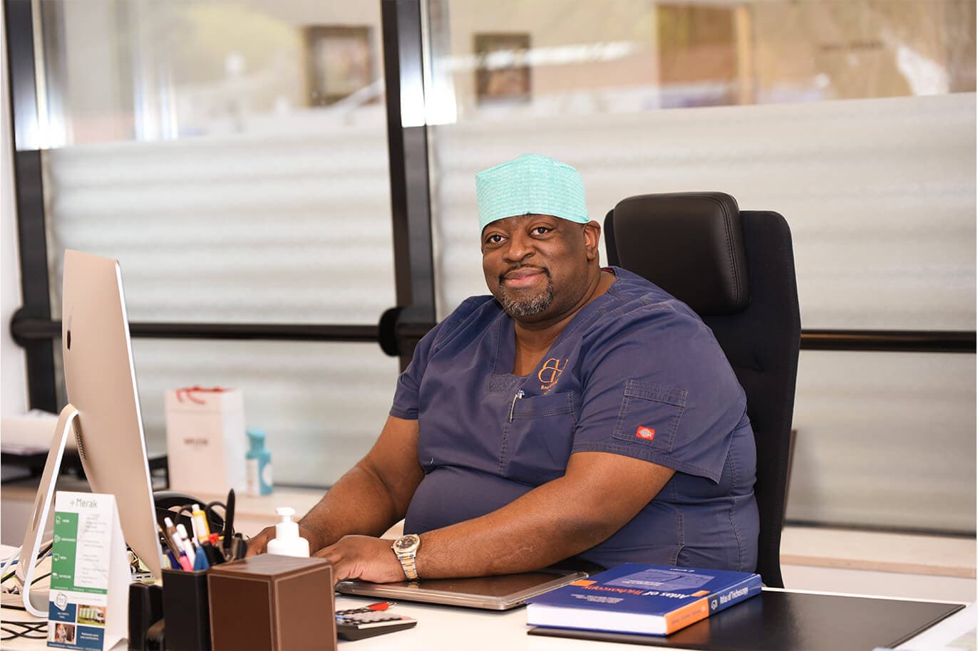Dr. Christian Bisanga